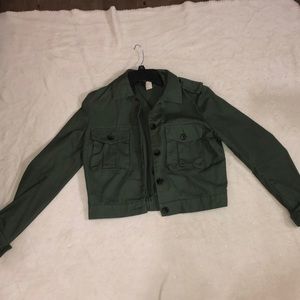 An olive green jean jacket.